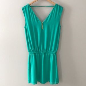 Green flowy mini dress.